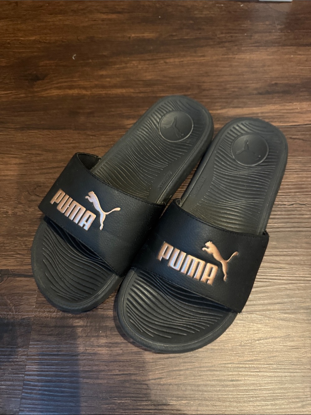 Puma Black Slides with Rose Gold Logo Accents